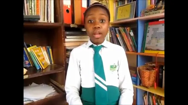 Nigeria's first child volunteer, eleven years old, speaking to camera